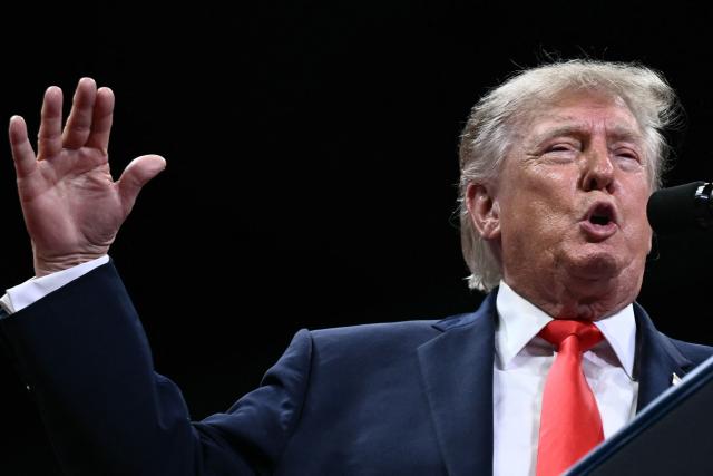 US President Donald Trump speaks at a midterm campaign rally at the Ocean Center in Daytona Beach, Florida on October 30, 2026. (Photo by Brendan SMIALOWSKI / AFP)