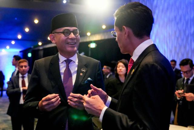 Indonesian Foreign Minister Arrmanatha Nasir listens to Mexican Foreign Minister Roberto Velasco Alvarez during the G20 foreign ministers' meeting in Atlanta, Georgia on October 30, 2026. US Secretary of State Marco Rubio is hosting his G20 counterparts, including Russia's Sergei Lavrov, for talks that are expected to be fractious, with wars in Ukraine and Iran and surging energy prices fanning discord. The foreign ministers' meeting in Atlanta, taking place just days before crucial US midterm elections, will set the stage for a December G20 leaders' summit in Miami at President Donald Trump's Doral resort. (Photo by Megan Varner / POOL / AFP)
