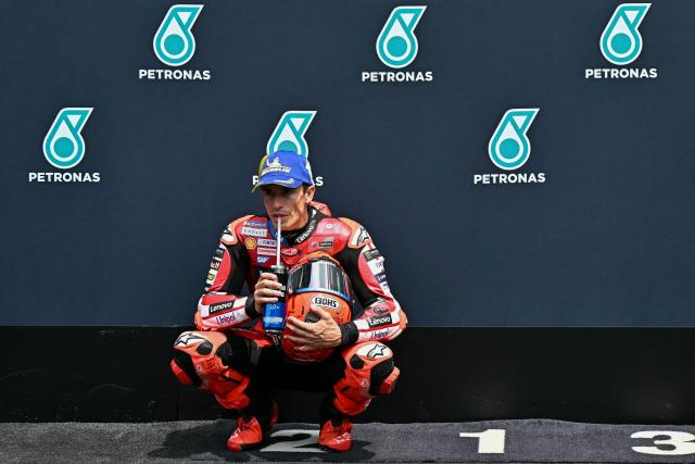 Ducati Lenovo Team's Spanish MotoGP rider Marc Marquez reacts after coming second place in the qualifying session of the MotoGP Malaysian Grand Prix at the Sepang International Circuit in Sepang on October 31, 2026. (Photo by MOHD RASFAN / AFP)