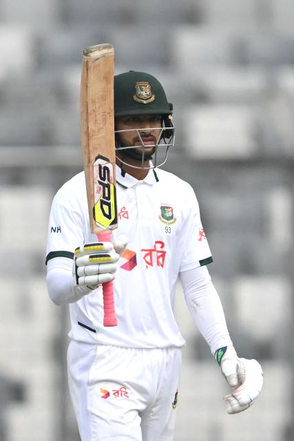 Bangladesh's Nayeem Hasan celebrates after scoring his half-century (50 runs) during the fourth day of the first test cricket match between Bangladesh and West Indies at the Sher-e-Bangla National Stadium in Mirpur on October 31, 2026. (Photo by Salahuddin Ahmed / AFP)