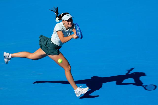 Uzbekistan's Kamilla Rakhimova hits a return against Canada's Leylah Fernandez during their semi-final match at the WTA Pan Pacific Open tennis tournament at Ariake Coliseum in Tokyo on October 31, 2026. (Photo by Yuichi YAMAZAKI / AFP)