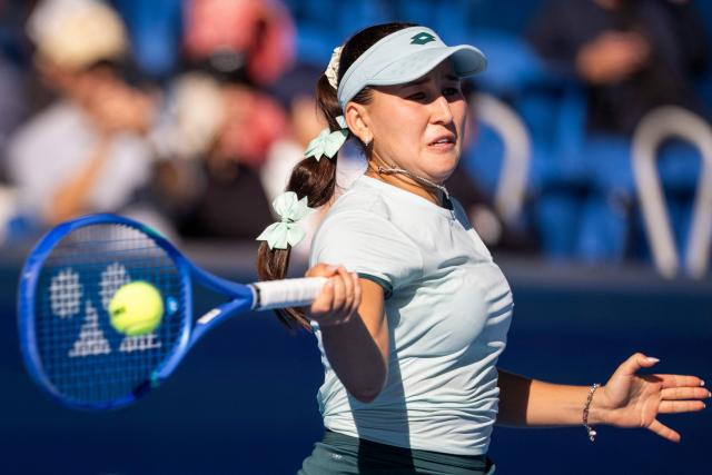 Uzbekistan's Kamilla Rakhimova hits a return against Canada's Leylah Fernandez during their semi-final match at the WTA Pan Pacific Open tennis tournament at Ariake Coliseum in Tokyo on October 31, 2026. (Photo by Yuichi YAMAZAKI / AFP)