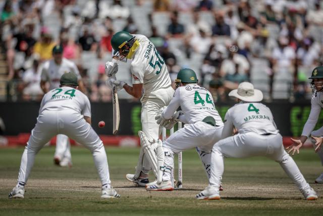 Australia's Mitchell Starc (C) plays a shot on day five of the third Test match between South Africa and Australia at Newlands stadium in Cape Town on October 31, 2026. (Photo by Marco Longari / AFP)