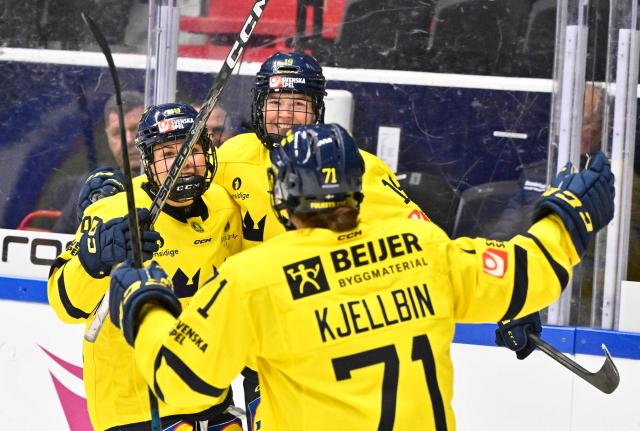 Sweden's #19 Sara Hjalmarsson celebrates with her team mates after scoring 1-0 during the Women's "Euro Ice Hockey Tour" ice hockey match between Sweden and Finland at Scaniarinken in Sodertalje, Sweden on October 31, 2026. (Photo by Viktoria BANK / TT News Agency / AFP) / Sweden OUT