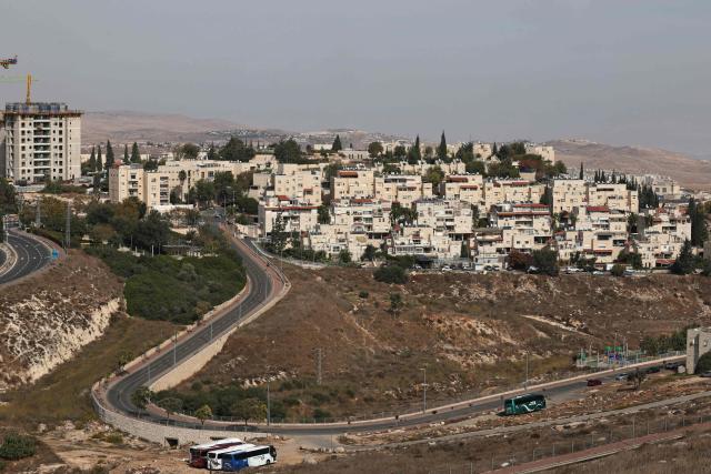 This photograph shows part of the Israeli settlement of Pisgat Zeev, built in a suburb of the predominantly-Arab and Israeli-annexed east Jerusalem, on October 31, 2026. (Photo by AHMAD GHARABLI / AFP)