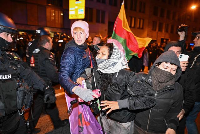 Riot Police scuffel with protesters after a demonstration organised by "GenZ regelt!" (Gen Z has got this!) in Frankfurt am Mian on October 31, 2026. The German demonstrations have been inspired by similar movements across Europe, including in France and Italy, which have seen young protesters voice anger at political elites whom they accuse of ignoring their concerns. (Photo by Kirill KUDRYAVTSEV / AFP)