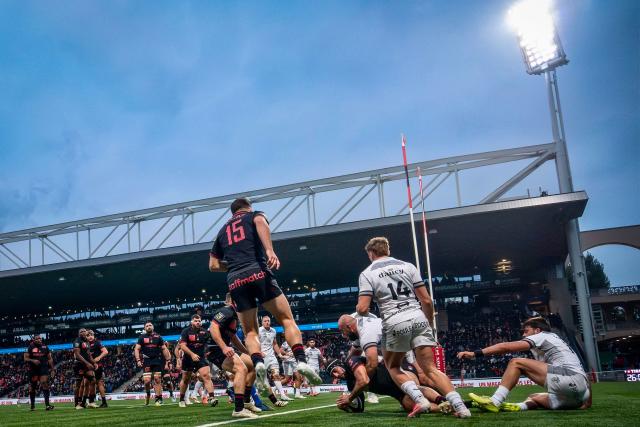 Lyon's French centre Theo Millet scores a try during the French Top 14 rugby union match between Lyon Olympique Universitaire Rugby (LOU) and RC Vannes at the Gerland Stadium in Lyon, eastern-France, on October 31, 2026. (Photo by OLIVIER CHASSIGNOLE / AFP)