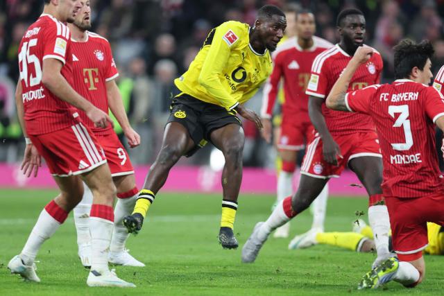 Dortmund's Guinean forward #09 Serhou Guirassy (C) scores the 1-1 goal during the German first division Bundesliga football match between FC Bayern Munich and BVB Borussia Dortmund in Munich, southern Germany, on October 31, 2026. (Photo by Alexandra BEIER / AFP) / DFL REGULATIONS PROHIBIT ANY USE OF PHOTOGRAPHS AS IMAGE SEQUENCES AND/OR QUASI-VIDEO