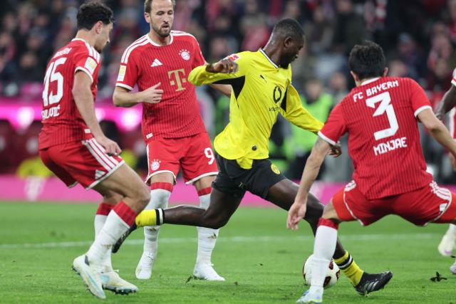 Dortmund's Guinean forward #09 Serhou Guirassy (C) scores the 1-1 goal during the German first division Bundesliga football match between FC Bayern Munich and BVB Borussia Dortmund in Munich, southern Germany, on October 31, 2026. (Photo by Alexandra BEIER / AFP) / DFL REGULATIONS PROHIBIT ANY USE OF PHOTOGRAPHS AS IMAGE SEQUENCES AND/OR QUASI-VIDEO