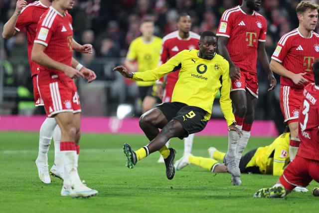 Dortmund's Guinean forward #09 Serhou Guirassy (C) scores the 1-1 goal during the German first division Bundesliga football match between FC Bayern Munich and BVB Borussia Dortmund in Munich, southern Germany, on October 31, 2026. (Photo by Alexandra BEIER / AFP) / DFL REGULATIONS PROHIBIT ANY USE OF PHOTOGRAPHS AS IMAGE SEQUENCES AND/OR QUASI-VIDEO