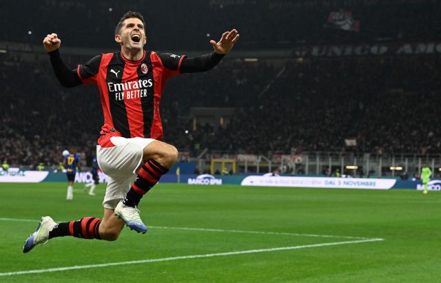 AC Milan's US forward #11 Christian Pulisic celebrates after scoring his team's first goal during the Italian Serie A football match between AC Milan and Inter Milan at the San Siro (Giuseppe Meazza) stadium in Milan, on October 31, 2026. (Photo by Stefano Rellandini / AFP)