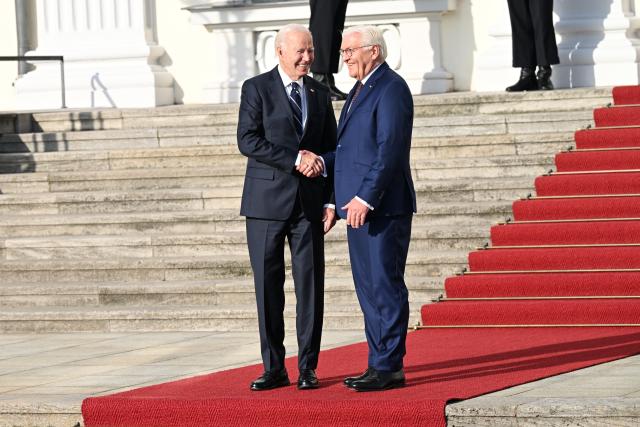 18 October 2024, Berlin: US President Joe Biden (L) is welcomed by German President Frank-Walter Steinmeier in front of Bellevue Palace. It is Biden's first bilateral visit to Germany in his almost four years in office. Photo: Annette Riedl/dpa