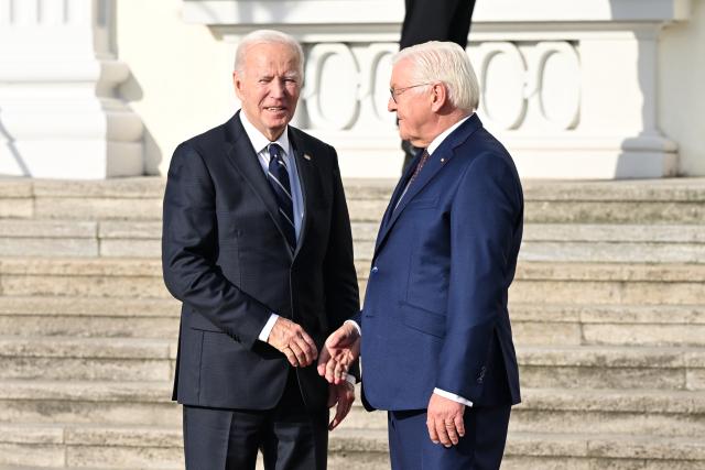 18 October 2024, Berlin: US President Joe Biden (L) is welcomed by German President Frank-Walter Steinmeier in front of Bellevue Palace. It is Biden's first bilateral visit to Germany in his almost four years in office. Photo: Annette Riedl/dpa