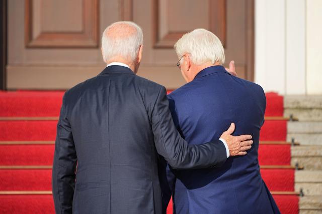 18 October 2024, Berlin: US President Joe Biden (L) is welcomed by German President Frank-Walter Steinmeier in front of Bellevue Palace. It is Biden's first bilateral visit to Germany in his almost four years in office. Photo: Michael Kappeler/dpa