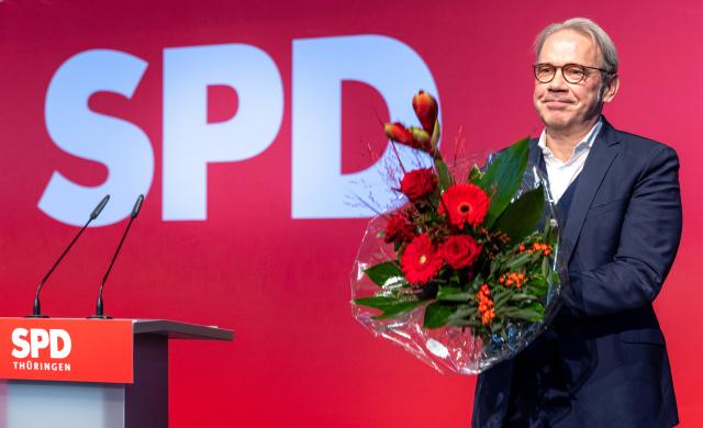 16 November 2024, Thuringia, Bad Blankenburg: Georg Maier reacts to his re-election as state party chairman at the Social Democratic Party of Germany Thuringia state party conference in the Stadthalle. The delegates want to elect a new state executive today. Photo: Michael Reichel/dpa