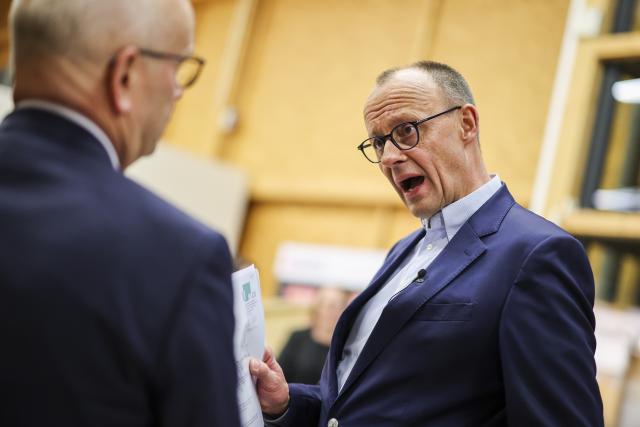 12 December 2024, North Rhine-Westphalia, Olsberg: Christian Democratic Union of Germany (CDU) federal chairman and candidate for chancellor Friedrich Merz attends a meeting with farmers at the Westphalian-Lippe Agricultural Association (WLV). Photo: Christoph Reichwein/dpa