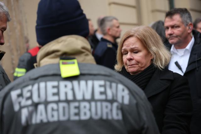 21 December 2024, Saxony-Anhalt, Magdeburg: Federal Minister of the Interior Nancy Faeser (SPD) visits the scene of the fatal attack at the Magdeburg Christmas market and thanks the fire department. The evening before, a driver drove into a group of people at the market, resulting in several fatalities and injuries. Photo: Jan Woitas/dpa