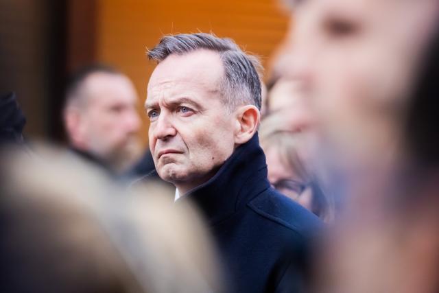 21 December 2024, Saxony-Anhalt, Magdeburg: Volker Wissing, German Minister of Transport and Digital Affairs, stands at the Christmas market in Magdeburg. The previous evening, a driver drove into a group of people at the market, causing fatalities and injuries. Photo: Christoph Soeder/dpa