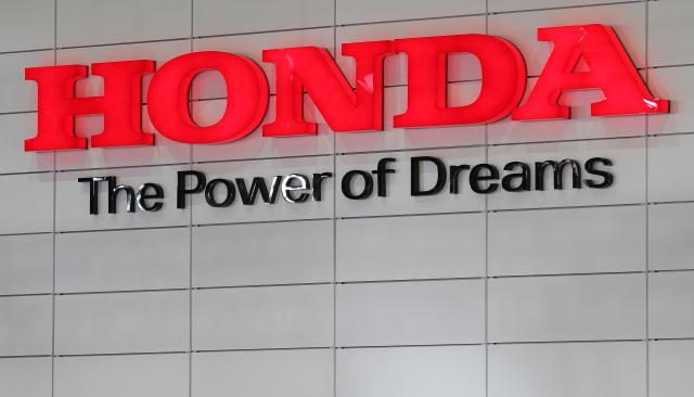 FILED - 14 April 2010, Saxony, Leipzig: Honda Motor Company's logo is pictured during the Auto Mobil International (AMI) motor show in Leipzig. Photo: Jan Woitas/zb/dpa