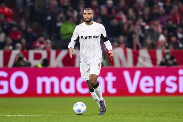 FILED - 03 December 2024, Bavaria, Munich: Leverkusen's Jonathan Tah in action during Germany's DFB Cup soccer match between Bayern Munich and Bayer Leverkusen at Allianz Arena.  The Bayer Leverkusen and Germany defender is set for a transfer to Barcelona next summer, the Mundo Deportivo newspaper reported on 26 December. Photo: Tom Weller/dpa - IMPORTANT NOTE: In accordance with the regulations of the DFL German Football League and the DFB German Football Association, it is prohibited to utilize or have utilized photographs taken in the stadium and/or of the match in the form of sequential images and/or video-like photo series.