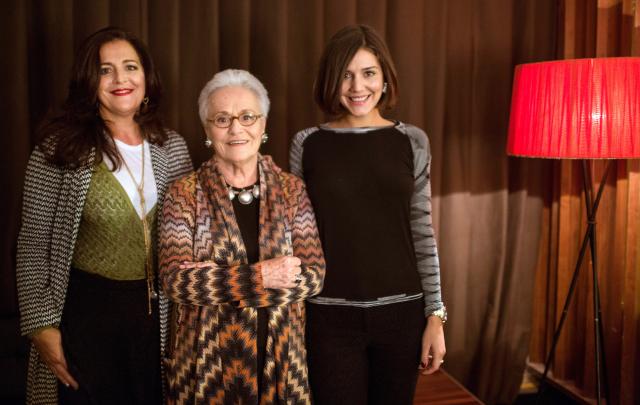 FILED - 01 December 2012, Berlin: Italian fashion designer Rosita Missoni (C) and her granddaughters Margherita Missoni (R) and Angela Missoni smile during the design meeting at the cinema International in Berlin. Rosita Missoni died on Thursday at the age of 93, a spokesperson for the Missoni brand that she co-founded told dpa, citing the family. Photo: picture alliance / dpa