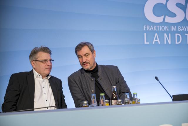 15 January 2025, Bavaria, Bad Staffelstein: Winfried Bausback (L), member of the state parliament, sits next to Markus Soeder, Bavarian Prime Minister during the Christian Social Union CSU winter retreat in Bavaria. Photo: Daniel Vogl/dpa