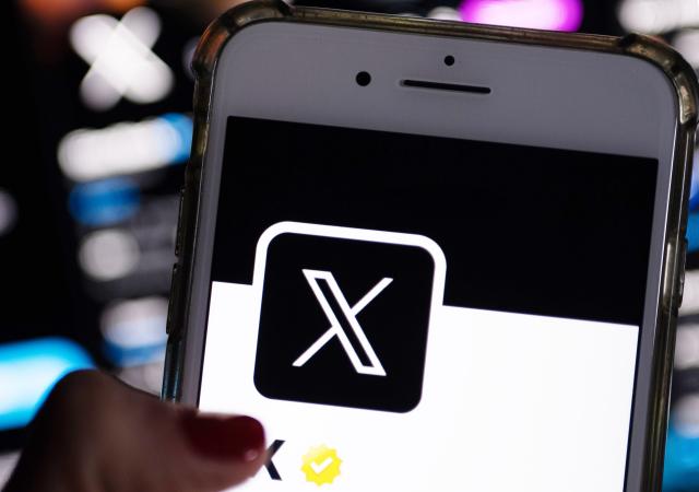 FILED - 24 July 2023, Berlin: The official profile of Platform X on the screen of a smartphone shows the white letter X on a black background. Photo: Monika Skolimowska/dpa