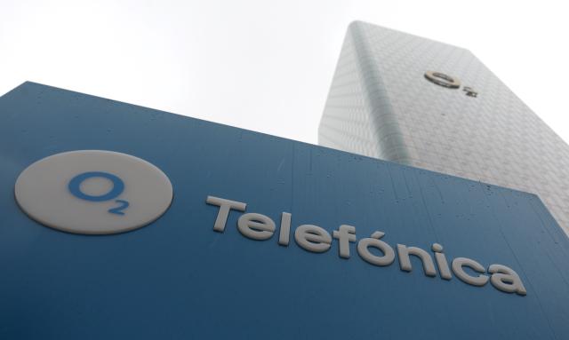 FILED - 03 November 2023, Bavaria, Munich: The logo of the telecommunications provider Telefonica can be seen on a sign in front of the German headquarters at the Uptown skyscraper. Photo: Karl-Josef Hildenbrand/dpa