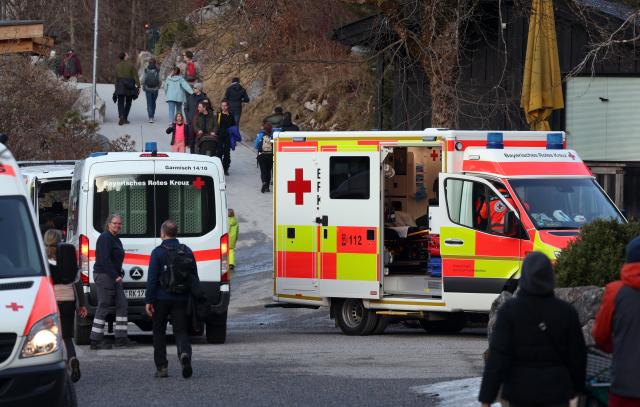 06 March 2025, Bavaria, Grainau: Red Cross emergency vehicles park on the shore of Lake Eibsee near the spot where several people break through the ice in the afternoon. Photo: Karl-Josef Hildenbrand/dpa