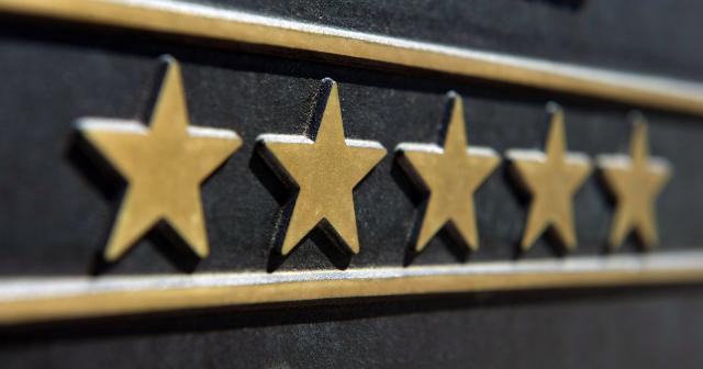 FILED - 10 June 2015, Mecklenburg-Western Pomerania, Ruegen: A brass sign with the stars of the German Hotel and Restaurant Association (Dehoga) hangs on the facade of a hotel on the island of Ruegen. Photo: Stefan Sauer/dpa-Zentralbild/dpa