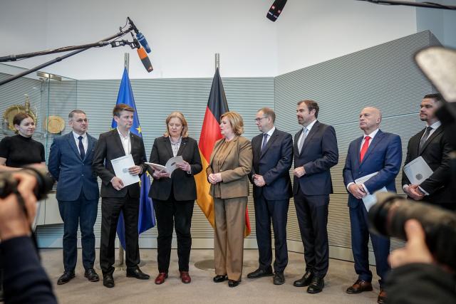 11 March 2025, Berlin: Parliamentary Commissioner for the Armed Forces Eva Hoegl hands over the 2024 Annual Report to President of the Bundestag Baerbel Bas alongside members of the Bundestag. Photo: Kay Nietfeld/dpa