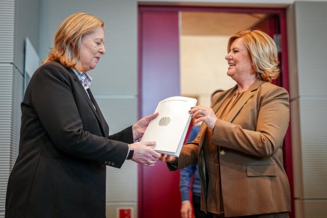 11 March 2025, Berlin: Parliamentary Commissioner for the Armed Forces Eva Hoegl hands over the 2024 Annual Report to President of the Bundestag Baerbel Bas (L). Photo: Kay Nietfeld/dpa