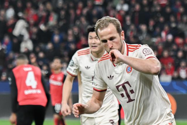 11 March 2025, North Rhine-Westphalia, Leverkusen: Munich's Harry Kane celebrates scoring his side's first  goal during the UEFA Champions League round of 16 second leg soccer match between Bayer Leverkusen and Bayern Munich at the BayArena. Photo: Fabian Strauch/dpa