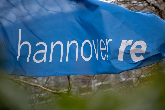 FILED - 18 February 2019, Lower Saxony, Hanover: A Hannover Re flag is flying in front of the insurance company's headquarters. Photo: Raphael Knipping/dpa