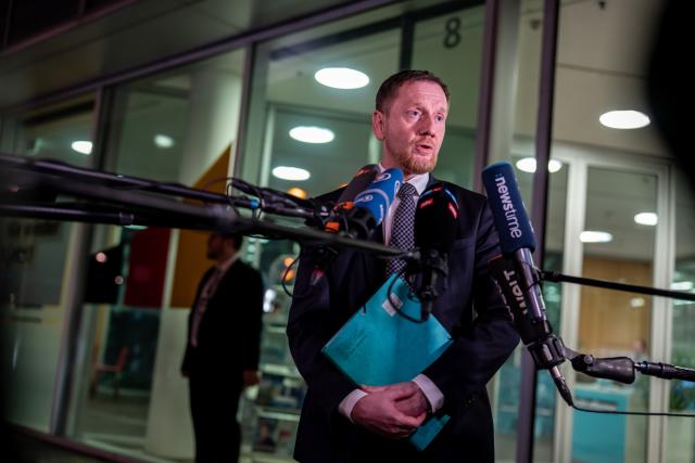 13 March 2025, Berlin: Michael Kretschmer of the Christian Democratic Union of Germany (CDU), Minister President of Saxony, arrives at the CDU headquarters, the Konrad Adenauer Haus, where the first round of coalition negotiations between the CDU/CSU and Social Democratic Party of Germany (SPD) is taking place to form a new government after the Bundestag elections. Photo: Michael Kappeler/dpa