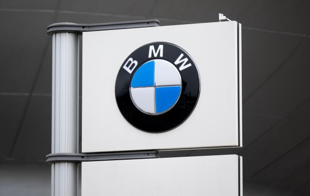 FILED - 04 February 2025, Bavaria, Munich: The BMW logo can be seen on a sign at the headquarters building of the vehicle manufacturer in Munich. Photo: Sven Hoppe/dpa