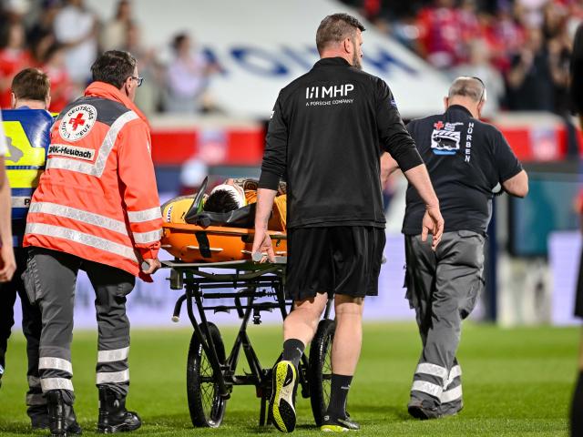 02 May 2025, Baden-Württemberg, Heidenheim: Heidenheim goalkeeper Kevin Mueller is carried off on a stretcher during the German Bundesliga soccer match between FC Heidenheim and VfL Bochum at Voith-Arena. Photo: Harry Langer/dpa - IMPORTANT NOTE: In accordance with the regulations of the DFL German Football League and the DFB German Football Association, it is prohibited to utilize or have utilized photographs taken in the stadium and/or of the match in the form of sequential images and/or video-like photo series.