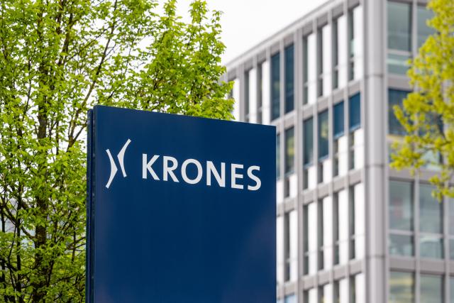 FILED - 25 April 2022, Bavaria, Neutraubling: A view of the logo of Krones AG in front of an administration building. German packaging and bottling machine firm Krones AG on Friday reported a 3.6% rise in first-quarter profits. Photo: Armin Weigel/dpa