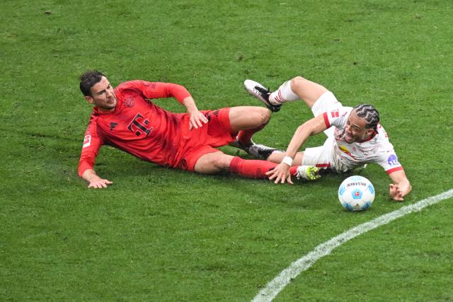 FILED - 03 May 2025, Berlin: Munich's Leon Goretzka (l) and Leipzig's Xavi Simons fight for the ball during German Bundesliga soccer match between 1. FC Union Berlin and Werder Bremen at An der Alten Foersterei. Photo: Andreas Gora/dpa - IMPORTANT NOTE: In accordance with the regulations of the DFL German Football League and the DFB German Football Association, it is prohibited to utilize or have utilized photographs taken in the stadium and/or of the match in the form of sequential images and/or video-like photo series.
