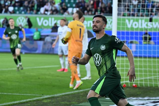 09 May 2025, Lower Saxony, Wolfsburg: Wolfsburg's Mohamed Amoura celebrates scoring his side's first goal during the German Bundesliga soccer match between VfL Wolfsburg and TSG 1899 Hoffenheim at the Volkswagen Arena. Photo: Swen Pförtner/dpa - IMPORTANT NOTICE: DFL and DFB regulations prohibit any use of photographs as image sequences and/or quasi-video.