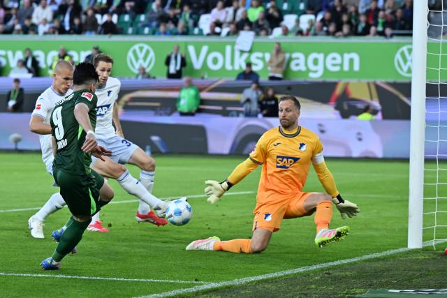 09 May 2025, Lower Saxony, Wolfsburg: Wolfsburg's Mohamed Amoura scores his side's first goal during the German Bundesliga soccer match between VfL Wolfsburg and TSG 1899 Hoffenheim at the Volkswagen Arena. Photo: Swen Pförtner/dpa - IMPORTANT NOTICE: DFL and DFB regulations prohibit any use of photographs as image sequences and/or quasi-video.
