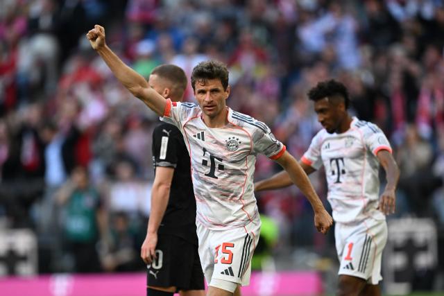 10 May 2025, Bavaria, Munich: Munich's Thomas Mueller celebrates after Harry Kane scored his side's first goal during the German Bundesliga soccer match between FC Bayern Munich and Borussia Moenchengladblach at Allianz Arena. Photo: Sven Hoppe/dpa
