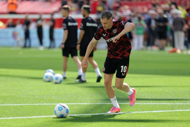 11 May 2025, North Rhine-Westphalia, Leverkusen: Leverkusen's Florian Wirtz warms up during the German Bundesliga soccer match between Bayer Leverkusen and Borussia Dortmund at BayArena. Photo: Rolf Vennenbernd/dpa - IMPORTANT NOTICE: DFL and DFB regulations prohibit any use of photographs as image sequences and/or quasi-video.