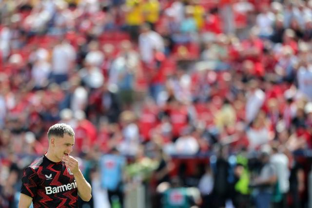 11 May 2025, North Rhine-Westphalia, Leverkusen: Leverkusen's Florian Wirtz warms up during the German Bundesliga soccer match between Bayer Leverkusen and Borussia Dortmund at BayArena. Photo: Rolf Vennenbernd/dpa - IMPORTANT NOTICE: DFL and DFB regulations prohibit any use of photographs as image sequences and/or quasi-video.