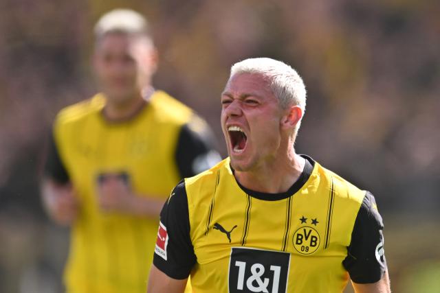 11 May 2025, North Rhine-Westphalia, Leverkusen: Dortmund's Julian Ryerson celebrates scoring his side's second goal during the German Bundesliga soccer match between Bayer Leverkusen and Borussia Dortmund at BayArena. Photo: Marius Becker/dpa - IMPORTANT NOTICE: DFL and DFB regulations prohibit any use of photographs as image sequences and/or quasi-video.