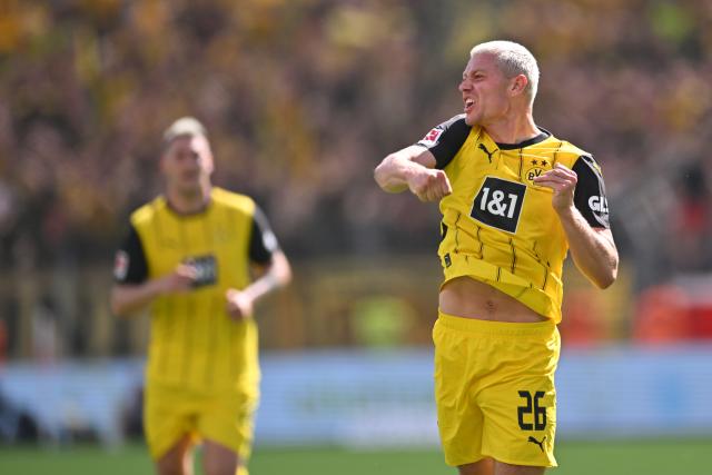 11 May 2025, North Rhine-Westphalia, Leverkusen: Dortmund's Julian Ryerson celebrates scoring his side's second goal during the German Bundesliga soccer match between Bayer Leverkusen and Borussia Dortmund at BayArena. Photo: Marius Becker/dpa - IMPORTANT NOTICE: DFL and DFB regulations prohibit any use of photographs as image sequences and/or quasi-video.