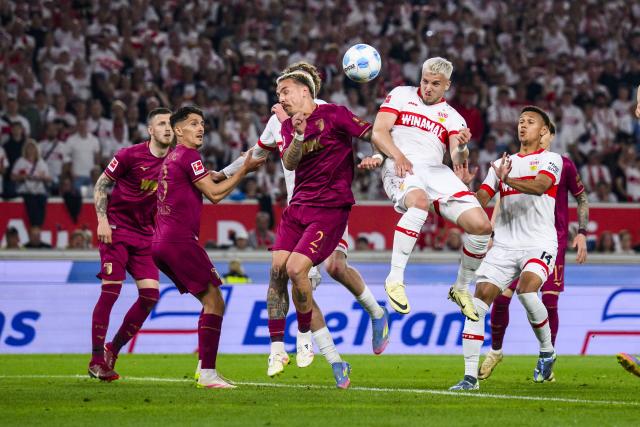 11 May 2025, Baden-Wuerttemberg, Stuttgart: Stuttgart's Ermedin Demirovic (2nd R) scores his side's fourth goal during the German Bundesliga soccer match between VfB Stuttgart and FC Augsburg at MHPArena. Photo: Tom Weller/dpa - WICHTIGER HINWEIS: Gemäß den Vorgaben der DFL Deutsche Fußball Liga bzw. des DFB Deutscher Fußball-Bund ist es untersagt, in dem Stadion und/oder vom Spiel angefertigte Fotoaufnahmen in Form von Sequenzbildern und/oder videoähnlichen Fotostrecken zu verwerten bzw. verwerten zu lassen.