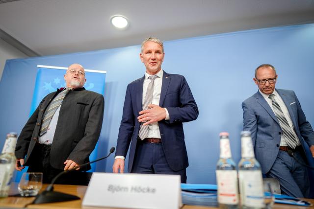 12 May 2025, Berlin: Bjoern Hoecke (C), parliamentary group and state chairman of the Alternative for Germany (AfD) Thuringia, and Joerg Urban (R), parliamentary group and state chairman of the AfD Saxony, present a legal opinion on the subject of the observation of the Office for the Protection of the Constitution at a press conference. On the left is constitutional and administrative law expert Michael Elicke. Photo: Kay Nietfeld/dpa