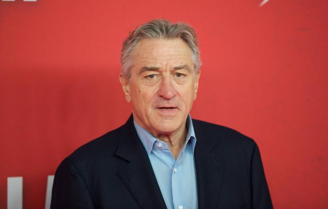 FILED - 15 October 2013, Berlin: American actor Robert de Niro arrives to the premiere of the movie 'Malavita - The Family' in the Kulturbrauerei in Berlin. De Niro is expected at the opening ceremony of the 78th Cannes Film Festival, during which the 81-year-old is to receive an honorary Palm d'Or for his life's work - much of it having graced the event over the last 50 years. Photo: picture alliance / dpa
