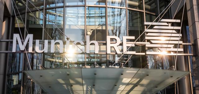 FILED - 21 April 2021, Bavaria, Munich: The Munich Re logo and lettering pictured at the main entrance to the administrative building of Muenchener Rueckversicherungs-Gesellschaft AG (Munich Re) in Munich's Schwabing district. Photo: Peter Kneffel/dpa